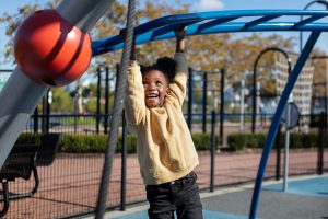 kid-playing-outdoorns-park